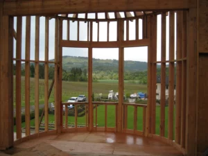 Interior framing of curved turret wall in Newberg, Oregon