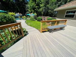 Composite deck surface with railing and garden path in Sherwood, Oregon